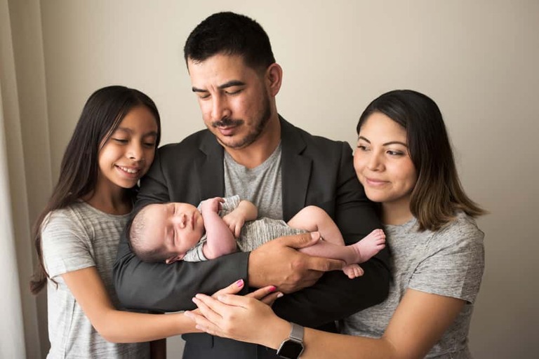 Newborn and family session, lumberjack and pine