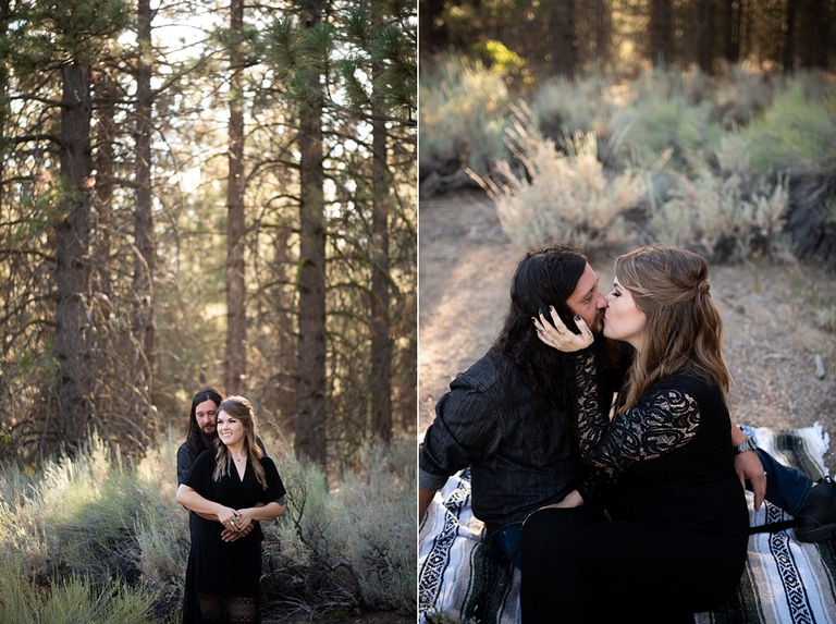 Couple in front of forest embracing for engagement photos